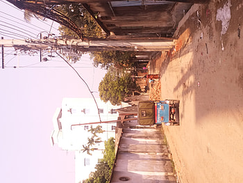 Here people are fixing the road full of chariots HD wallpaper