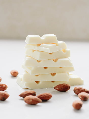 Delicious white chocolate stacked with almonds for a gourmet treat HD phone wallpaper