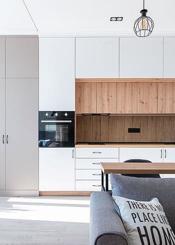 Bright, modern kitchen interior with minimalist design and wooden accents. Ideal for contemporary home inspiration. HD phone wallpaper