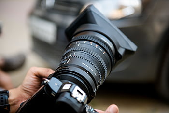 Close-up of a professional camera lens, captured with precision. Ideal for graphy enthusiasts. HD wallpaper