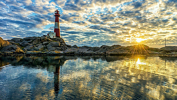Lighthouse in Norway, coast, clouds, sky, rocks, water, sunset, reflections HD wallpaper