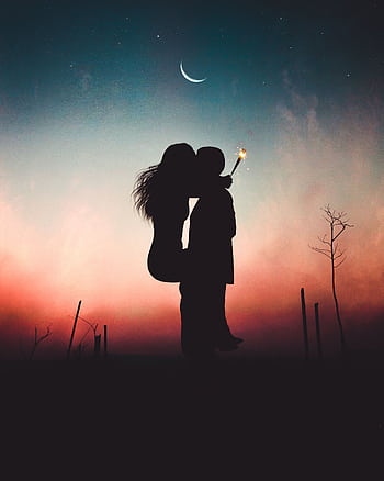 Silhouette of a romantic couple kissing under a crescent moon at dusk, creating a serene and magical ambiance. HD phone wallpaper