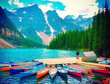 Moraine Lake in Alberta - Canada, attractions in dreams, beauty of nature, summer, love four seasons, lakes, boats, clouds, trees, nature, sky, mountains HD wallpaper