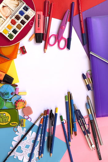 Vibrant collection of art and school supplies arranged in a flat lay. Perfect for educational themes. HD phone wallpaper