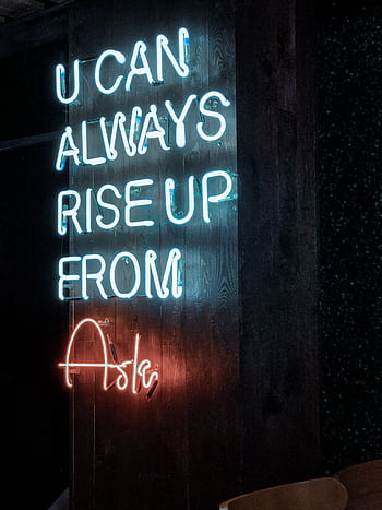 Neon sign stating 'U CAN ALWAYS RISE UP FROM ASHES' on a dark background, glowing brightly. HD phone wallpaper