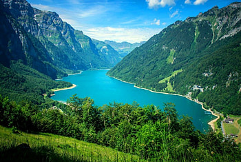 Klontalersee, Switzerland, beautiful, houses, lake, summer, cliffs, lake beach, clouds, nature, green grass, mountains, water, forest HD wallpaper