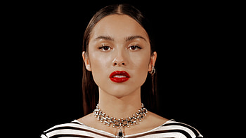 Beautiful Olivia Rodrigo Is Wearing White Black Dress Standing In Black Background Girls HD wallpaper