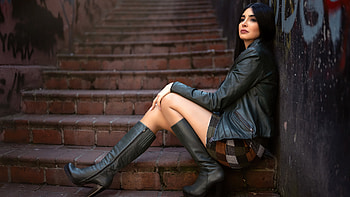 Girl Model Is Sitting On Stairs Wearing Black Leather Jacket And High Heeled Boots In Painting Wall Background Girls HD wallpaper