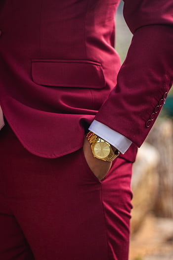Close-up of a man in a burgundy suit showcasing a stylish gold wristwatch, perfect for formal elegance. HD phone wallpaper