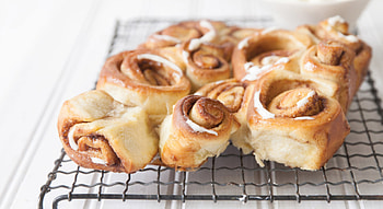 Coffee and a cinnamon bun, Cozy indulgence, Sweet pairing, Warm and inviting HD wallpaper