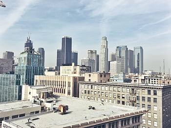 A breathtaking view of Los Angeles skyscrapers under a clear sky. HD wallpaper