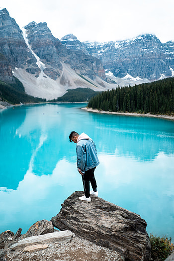 Nature, Mountains, Rock, Lake, Miscellanea, Miscellaneous, Stone, Human, Person HD phone wallpaper