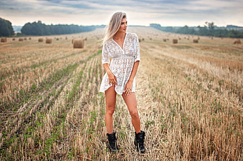 Cowgirl in a Hay Field, cowgirl, dress, blonde, field, hay HD wallpaper