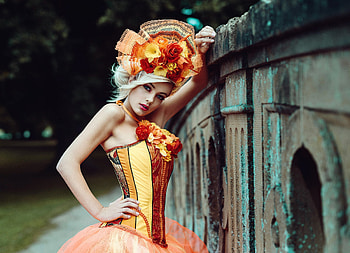 Beauty, corset, model, flower, girl, orange, woman HD wallpaper