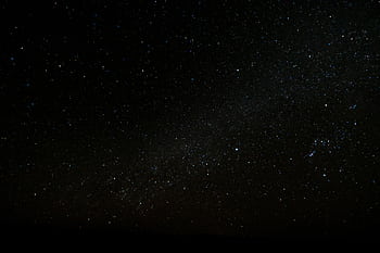 Capture of the starry night sky over Ksar Tanamouste, Morocco, showcasing a vibrant universe. HD wallpaper