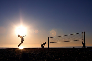 Beach Volleyball, Professional athletes, Sand court action, Intense competition HD wallpaper