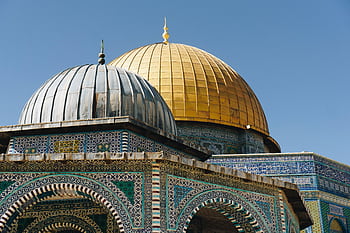 Brightly detailed capture of the iconic Dome of the Rock in Jerusalem, showcasing intricate Islamic architecture. HD wallpaper