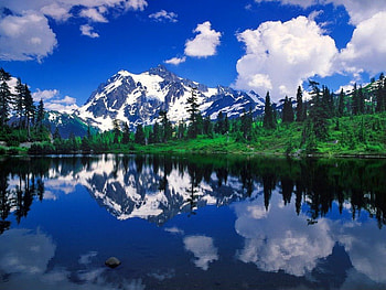 Mount Shuksan, blue, peaks, serenity, nice, quiet, shuksan, shore, reflection, hills, snowy, slope, mount, beautiful, mountain, cliffs, mirrored, sky, lovely, calmness HD wallpaper