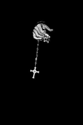 Elegant black and white of a hand holding a rosary against a black background HD phone wallpaper