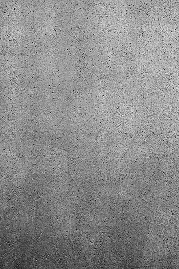 Detailed texture of a gray concrete wall with rough surface, perfect for industrial backgrounds. HD phone wallpaper