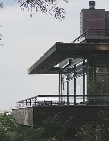 A contemporary house with glass windows and balcony design located in Toronto, Canada. HD phone wallpaper