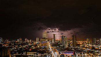 Thunderstorms Above City During Night Time, thunderstorm, city, lightning, night, evening, graphy HD wallpaper