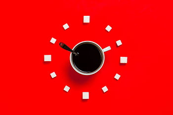 Artistic coffee composition with sugar cubes on a striking red background, from above. HD wallpaper
