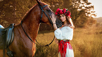 Beautiful Girl Model Is Standing Near Brown Horse Wearing White Dress And Red Flowers Wreath In Grass Field Background Girls HD wallpaper