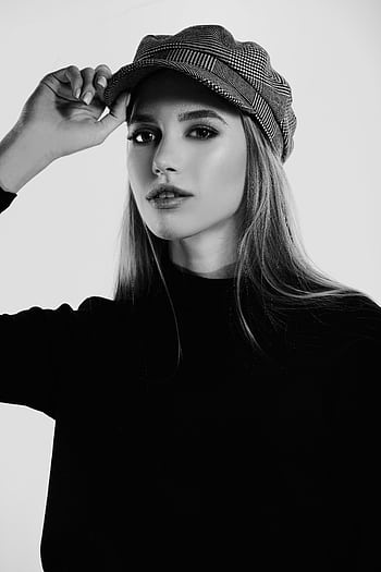 Stylish monochrome portrait of a young woman in a cap, elegance and fashion captured. HD phone wallpaper