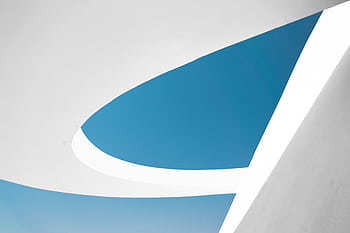An abstract view of modern architecture against a clear blue sky in Brasília, Brazil. HD wallpaper