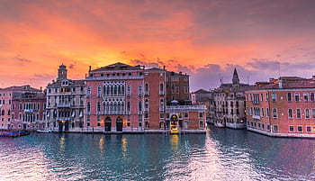 Captivating view of Venice's Grand Canal during sunset showcasing historic architecture and serene waters. HD wallpaper