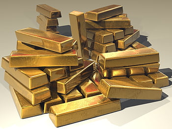 A pile of lustrous gold bars symbolizing wealth and prosperity. HD wallpaper