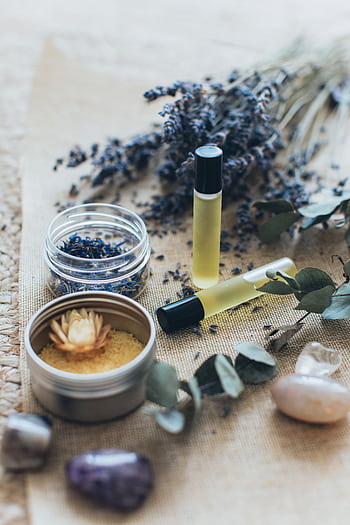 Elevate your relaxation with aromatherapy essentials featuring lavender and massage oils. HD phone wallpaper