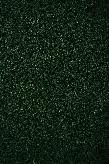Close-up of a dark green textured surface, perfect for backgrounds. HD phone wallpaper