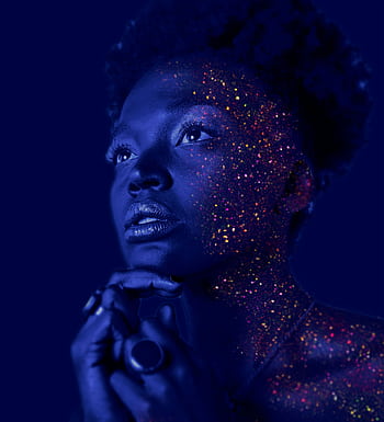 Mesmerizing portrait of a woman with glitter makeup and dramatic lighting. HD phone wallpaper