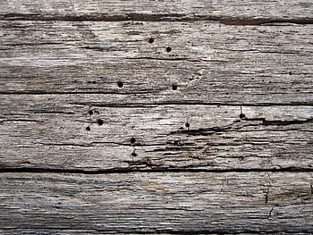 A close-up of weathered, rustic wooden planks showcasing natural texture. HD wallpaper