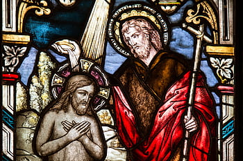Depicts a detailed stained glass artwork featuring biblical scenes in vivid colors. HD wallpaper