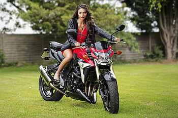 Elle on her Suzuki, model, brunette, leather coat, motorcycle, dress HD wallpaper