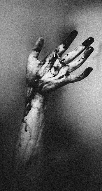 A monochrome of an outstretched hand with dark liquid dripping, creating a dramatic and moody atmosphere. HD phone wallpaper