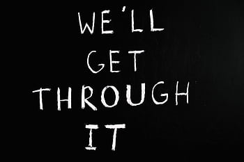 A motivational chalkboard message reading 'We'll get through it' on a black background. HD wallpaper