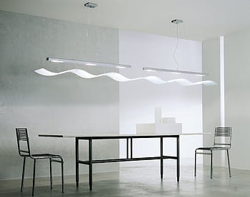 A contemporary minimalist room with sleek furniture, modern lighting, and clean design. HD wallpaper