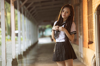 ASIAN MODEL IN UNIFORM, BLACK PLEATED SKIRT, WHITE BLOUSE, BRUNETTE, STANDING HD wallpaper