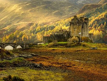 The Eilean Donan Castle,Scotland, architecture, trees, bridge, autumn, castle, mountains, forest HD wallpaper