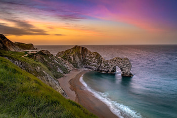 Dorset ~ Sunset, pink, dorset, water, orange, beach, sunset, england, sea, rock, stone HD wallpaper