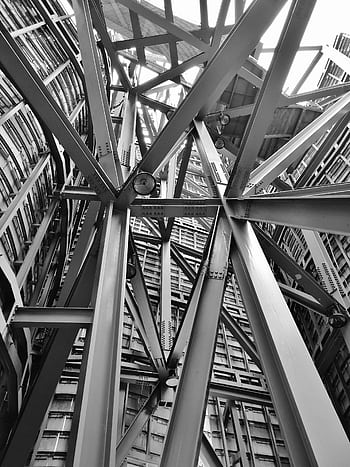 A detailed view of a complex steel framework showcasing modern industrial architecture. HD phone wallpaper