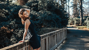Girl Sitting On Wooden Bridge Looking Back, girls, model, black-dress HD wallpaper