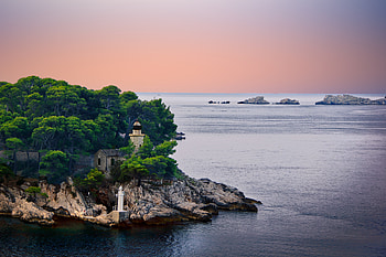 Coast, sea, sunset, lighthouse HD wallpaper