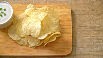 Potato chips with dipping sauce, Irresistible snack, Stock video footage, Craving satisfaction HD wallpaper