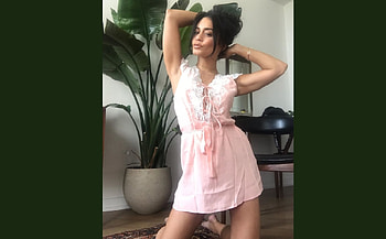 Vanessa Hudgens in Leisure Outfit, dark brunette, bracelet, kneeling, jewelry, pink leisure dress, necklaces, lace up front, area rug, mini skirt HD wallpaper