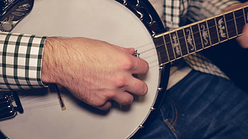 Man playing the banjo, Straight shot, , Stock video HD wallpaper
